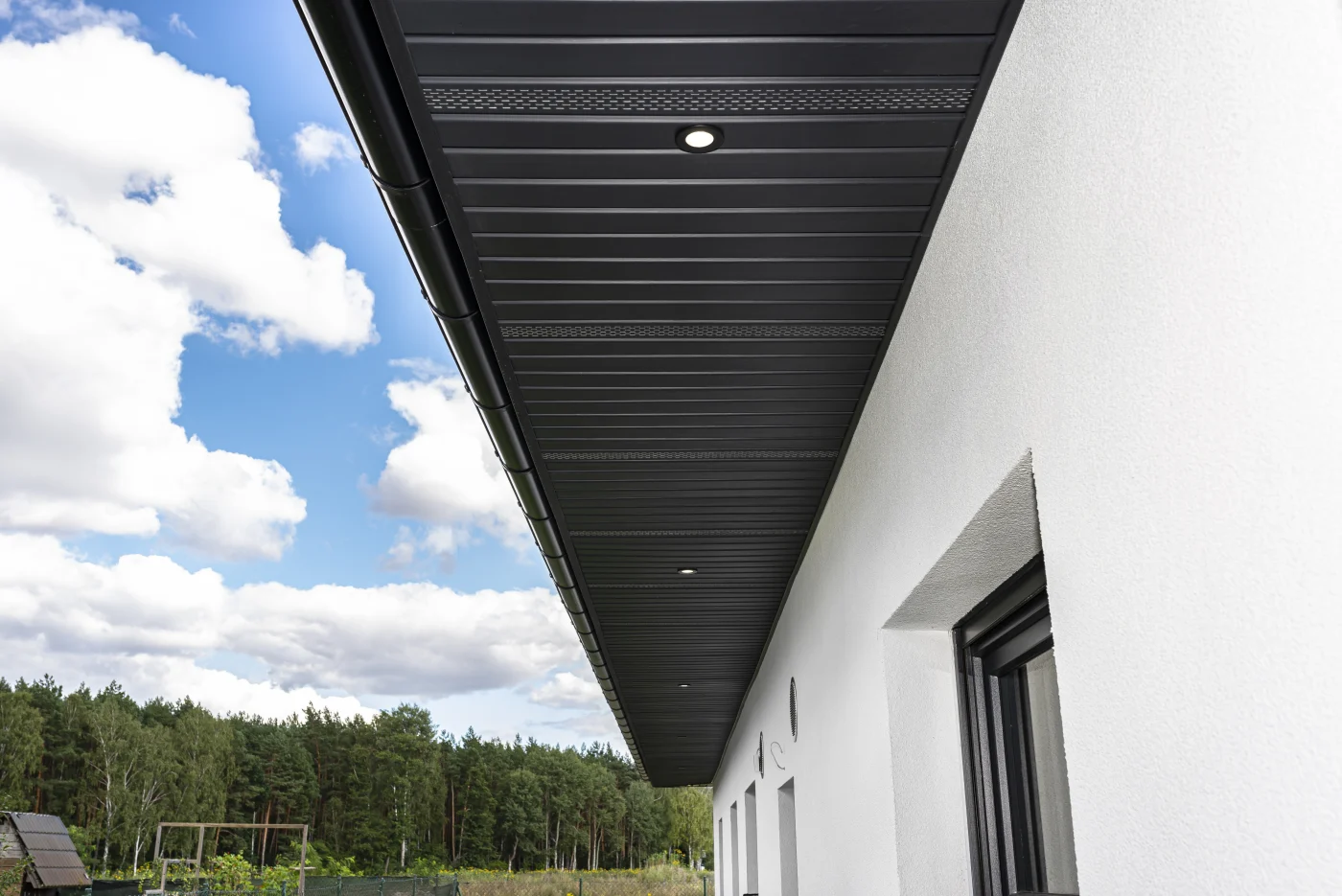View of modern black soffit with light installations
