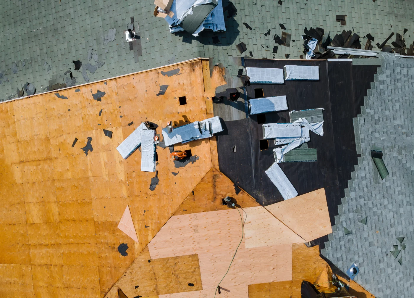 Roof repair in progress on a Memorial home