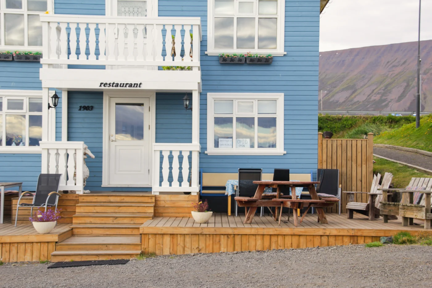 Restaurant with blue siding and white trim