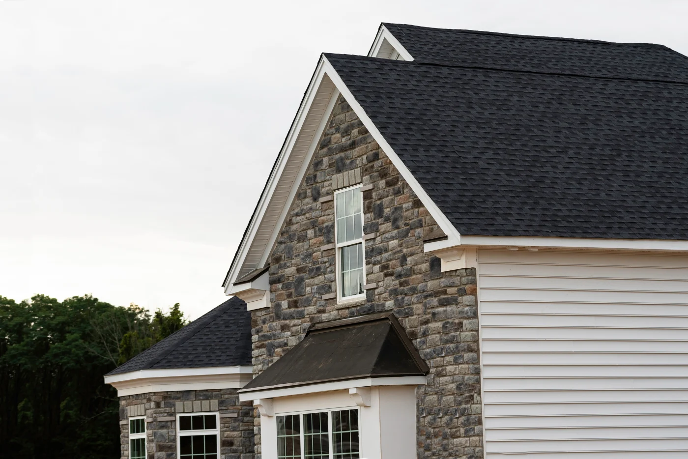 Home exterior improvements including siding and trim