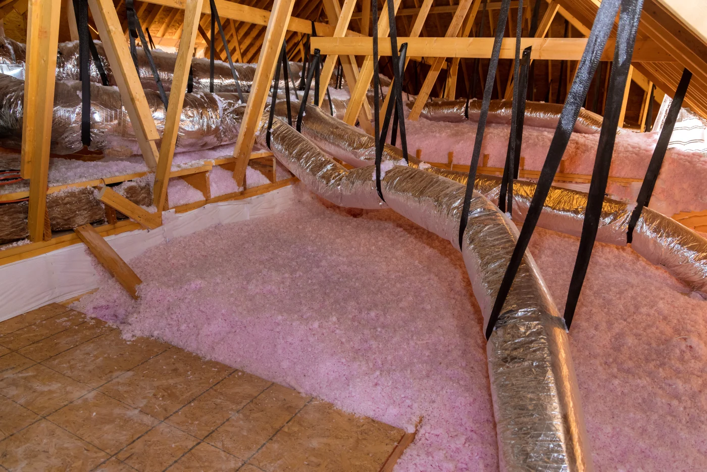 White johns manville insulation in home attic