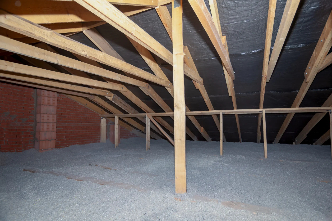 Blown in insulation in residential attic