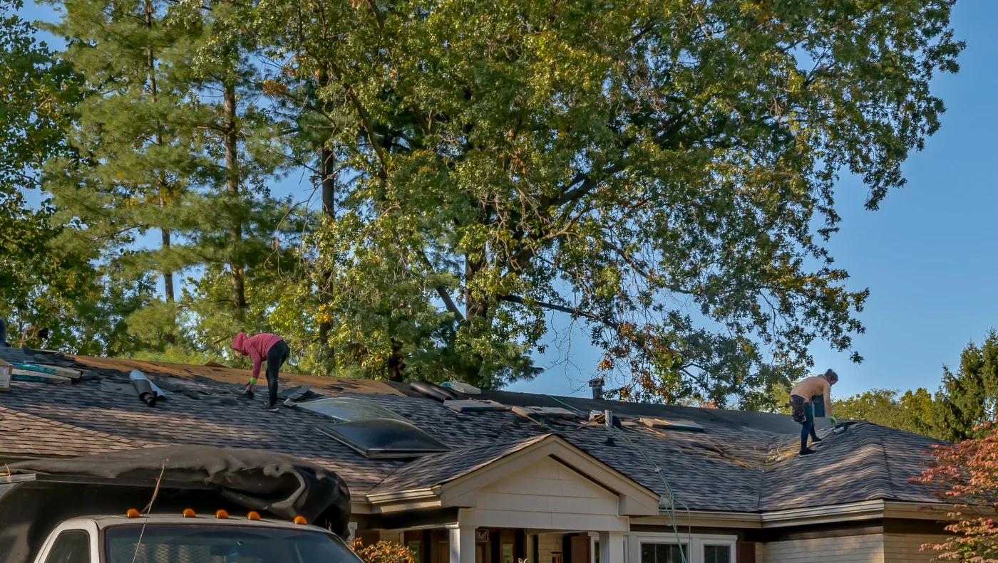 Damaged shingle roof after storm in Pasadena neighborhood