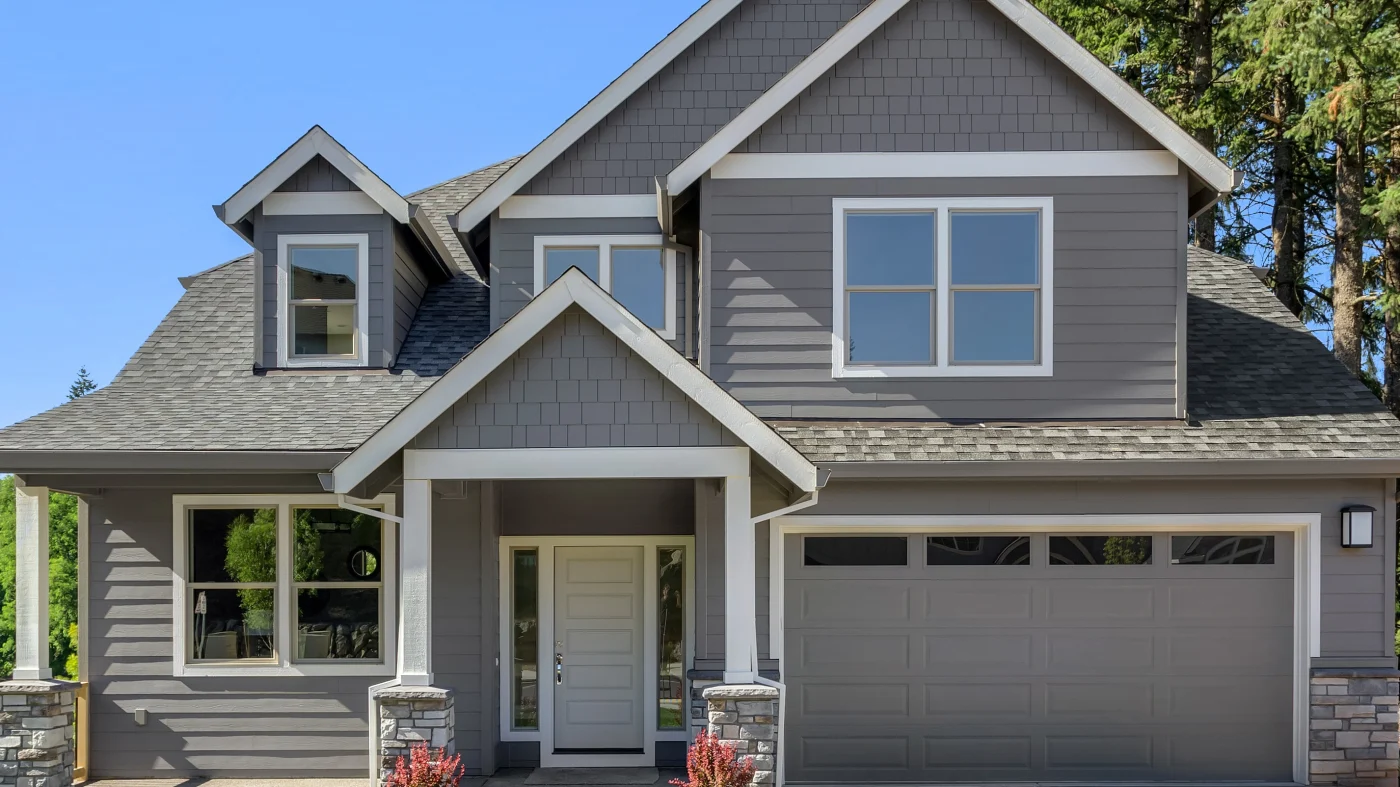 A home with gray siding and white trim