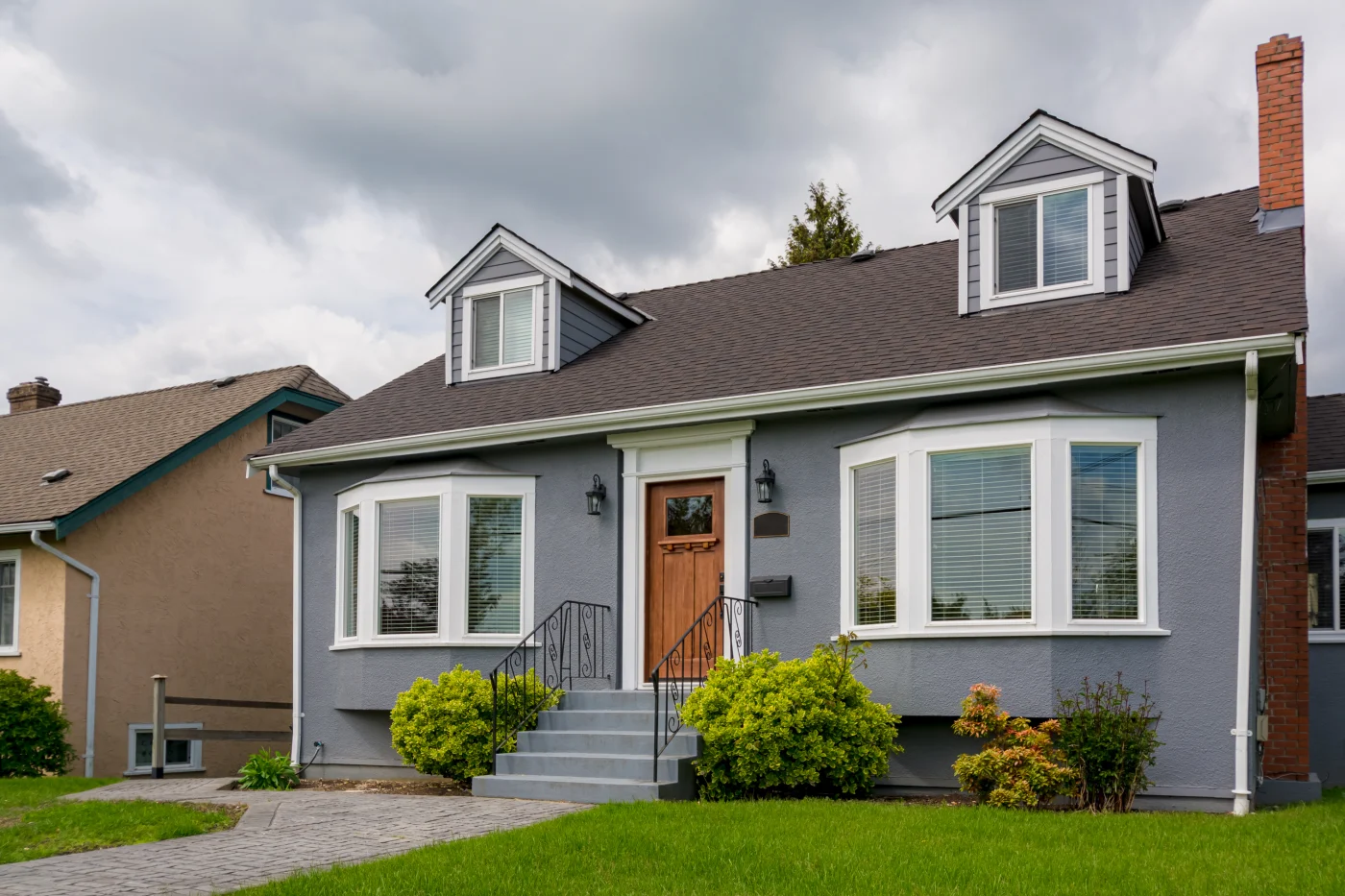 A small home with a new shingle roof